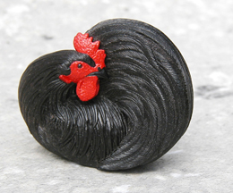 Small rooster sculpture