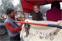 Two people with University of Wyoming banner