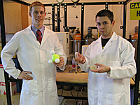 Two students in lab coats