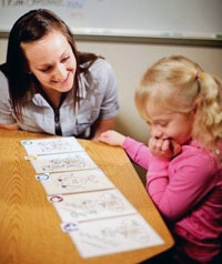 Woman teaching child