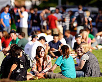 Students gathering on lawn