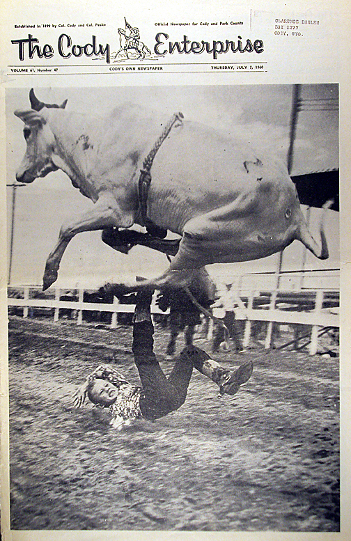 Bull riding photograph from The Cody Enterprise