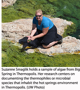 Suzanne Smaglik holds a sample of algae from Big Spring in Thermopolis. Her research centers on documenting the thermophiles or microbial species that inhabit the hot springs environment in Thermopolis. (UW Photo)