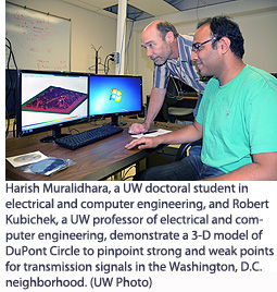 Harish Muralidhara, a UW doctoral student in electrical and computer engineering, and Robert Kubichek, a UW professor of electrical and computer engineering, demonstrate a 3-D model of DuPont Circle to pinpoint strong and weak points for transmission signals in the Washington, D.C. neighborhood. 
