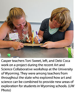 Casper teachers Toni Sweet, left, and Debi Coca work on a project during the recent Art and Science Collaborative workshop at the University of Wyoming. They were among teachers from throughout the state who explored how art and science can be combined to provide new areas of exploration for students in Wyoming schools. 