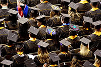 graduating students seen from above as a group of caps