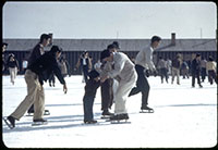 people ice skating outside