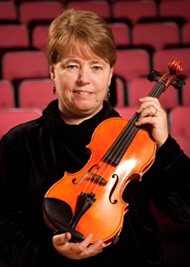 woman holding violin