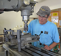 man working with machinery