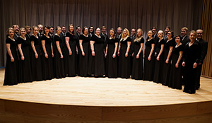 choir standing in curved rows