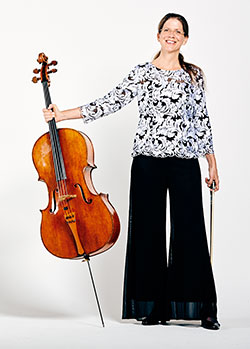 woman standing with cello