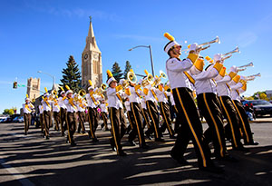 marching band performing in a parade