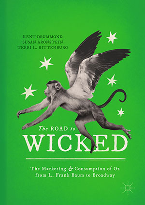 green book cover with flying monkey on it