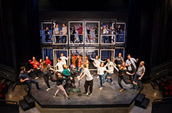 group of students rehearsing play on stage