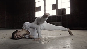 woman stretching on floor