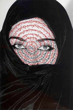 artwork of a woman in a headscarf with writing on her face