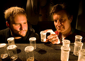 man and student in a lab
