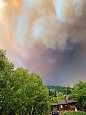 Mullen fire burns near a house in Centennial