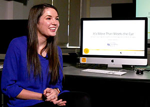 woman sitting beside computer