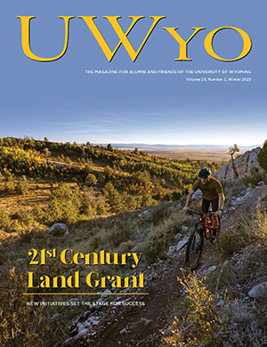 magazine cover with photo of person mountain biking