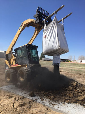 loader dumping coal char