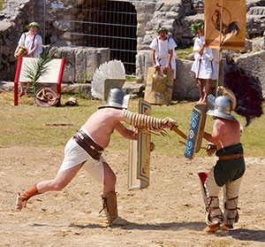 people dressed as gladiators sparring