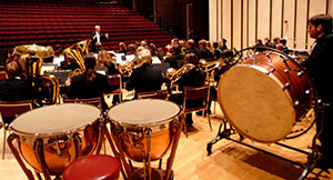 wind symphony seen from the back by the drums
