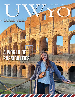 magazine cover with woman in front of ancient ruins