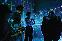 Visitors tour the Shell 3-D Visualization Lab at the UW Energy Innovation Center