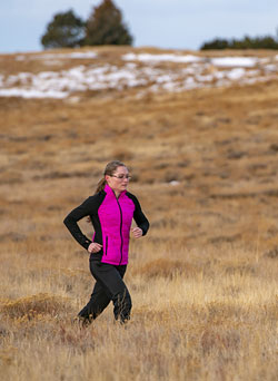 woman running on the prairie