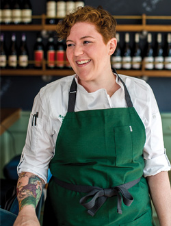 woman in a green apron