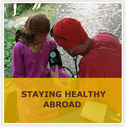 Staying Healthy Abroad with picture of doctor and patient