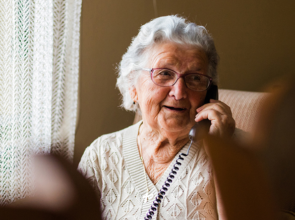 senior woman speaking on telephone