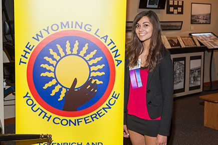 participant next to banner