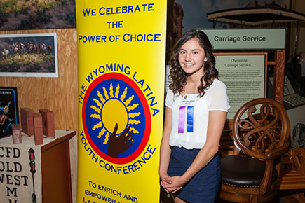 participant next to banner