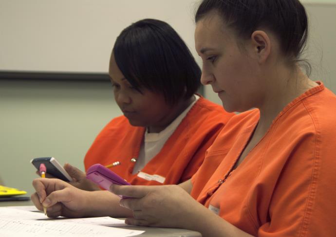 inmate students studying class material