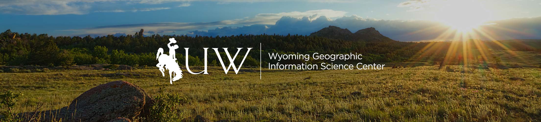 WyGISC logo over globe, maps, and aerial view