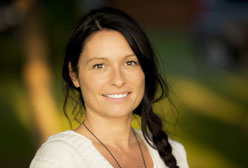 Young female volunteer with braided brown hair