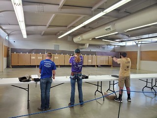line of 3 youth on the air pistol range