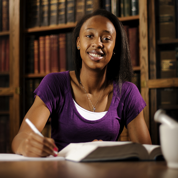 African Student in Library