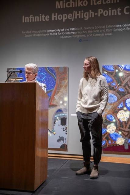 UW Art Opening Presentation with two people