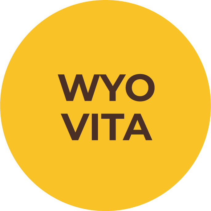 WyoVita text in yellow circle