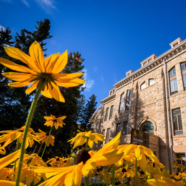 Flowers in bloom below Old Main