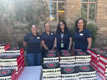 photo of staff at Saddle-up event