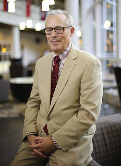 headshot photo of Craig Lewis