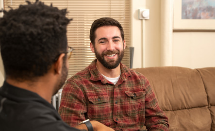 A UW student and UW ACES career counselor meet together to discuss career path options.