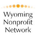 wyoming nonprofit network logo - black and gold