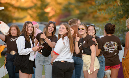 UW students meeting sororities and fraternities at Cowboy Carnival.