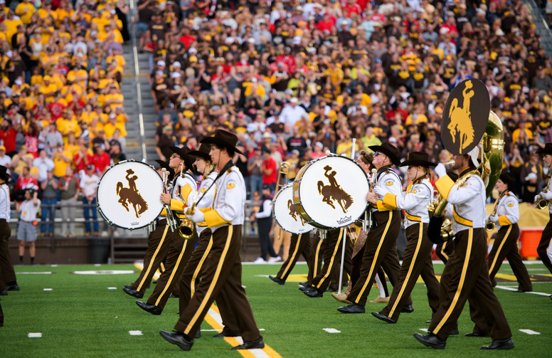 memebers of the Western Thunder marching band playing thier instruments during a halftime show