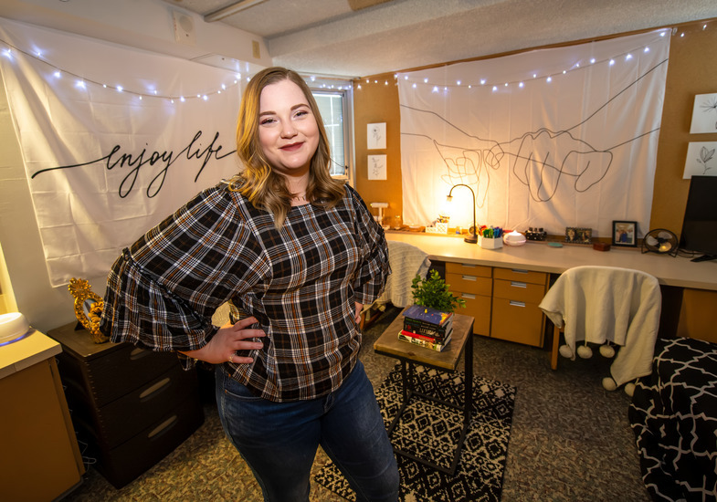 student shows off their dorm room style